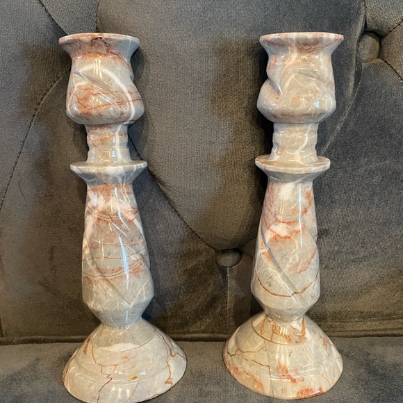 Vintage carved and polished marble candlesticks.